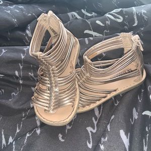 Gold gladiator sandals
